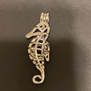 Seahorse pearl holding charm